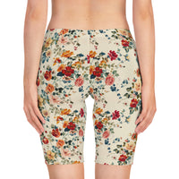 Back view of the Cream bike shorts worn by a female model, highlighting full glute coverage and comfort stretch.