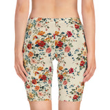 Back view of the Cream bike shorts worn by a female model, highlighting full glute coverage and comfort stretch.