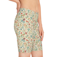 Side profile of the Blossom Cream bike shorts, worn by one female model, highlighting both print and sculpted shape.