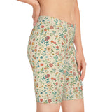 Side profile of the Blossom Cream bike shorts, worn by one female model, highlighting both print and sculpted shape.