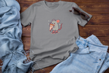 Lay Flat T-shirt with Pizza  Rat on Roller Skates Design surround by pants and sunglass.